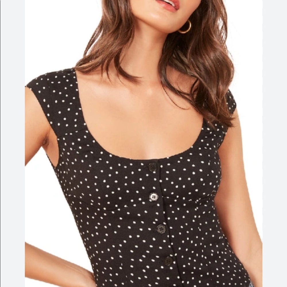 The cutest polka dot top from Reformation. 🖤 Perfect condition, new with tags.